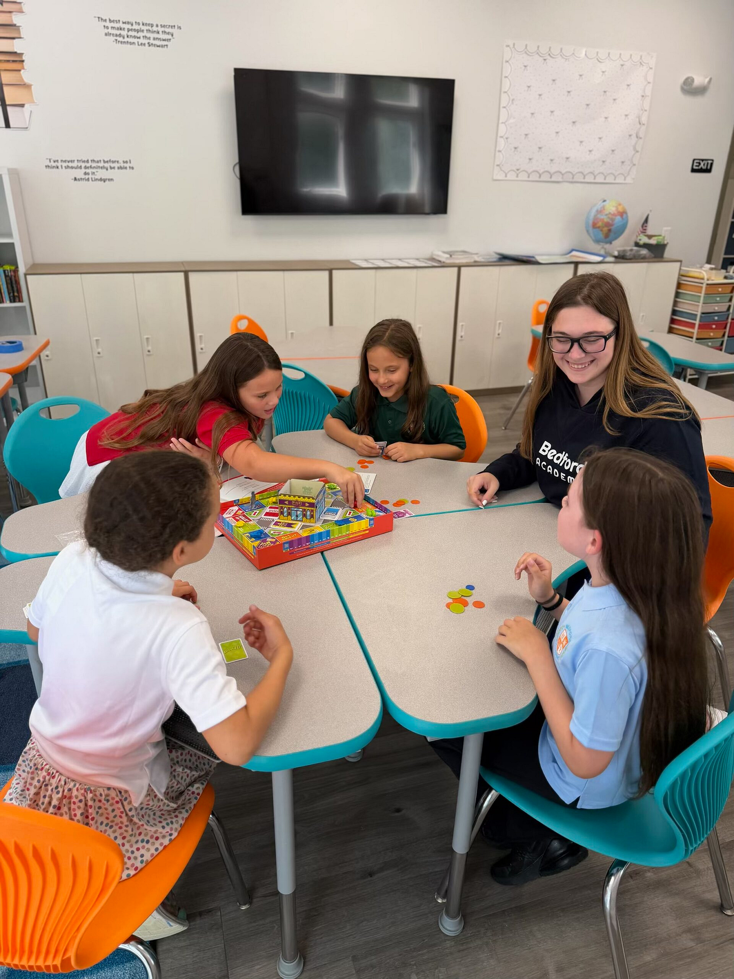 Bedford Academy students collaborating in a classroom activity