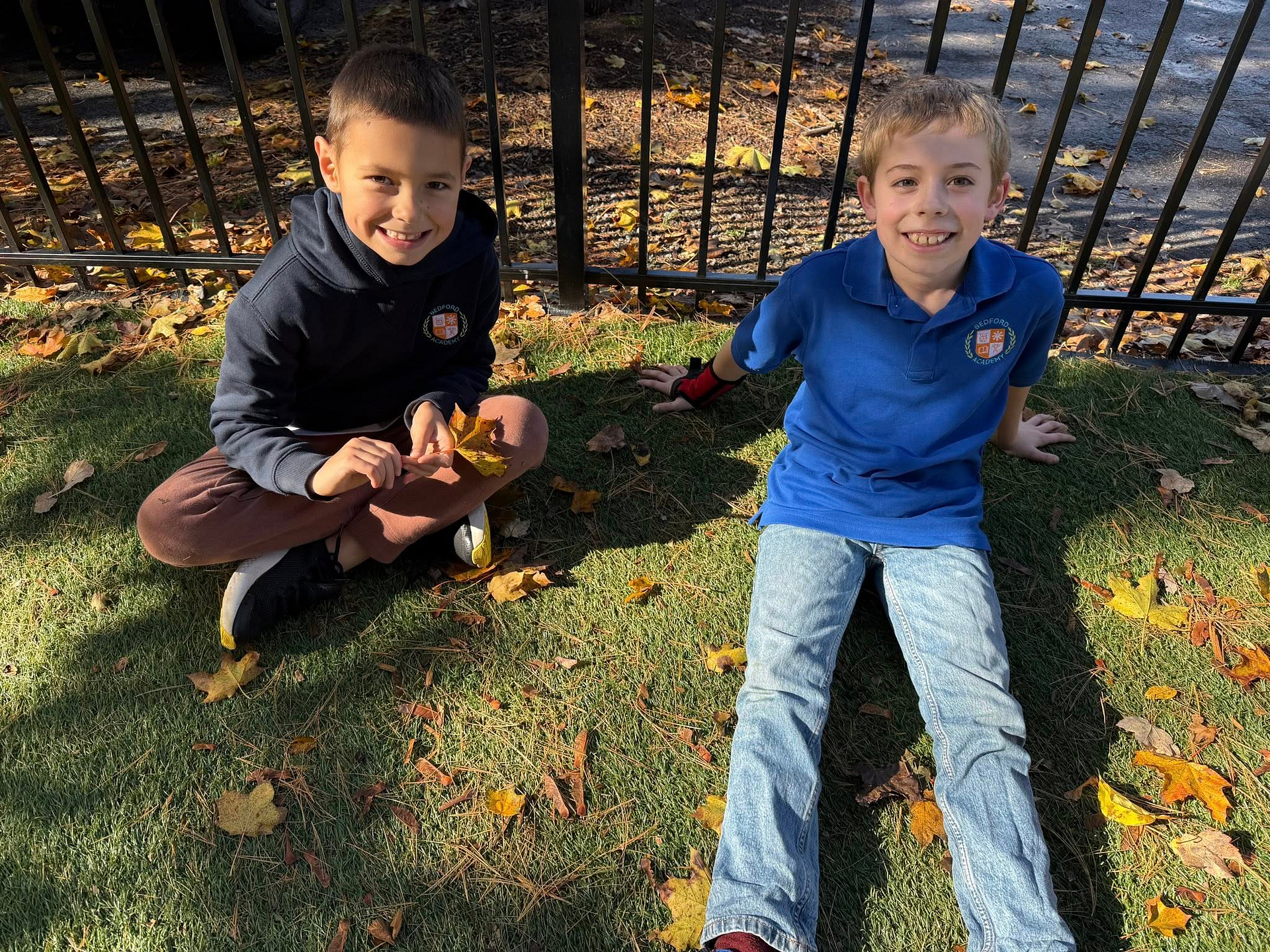 Bedford Academy students smiling together during outdoor learning
